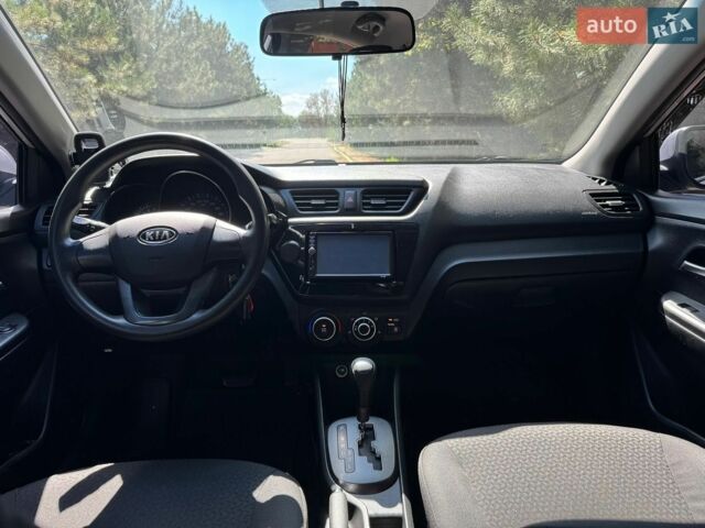 Сірий Кіа Ріо, об'ємом двигуна 1.4 л та пробігом 94 тис. км за 8799 $, фото 24 на Automoto.ua