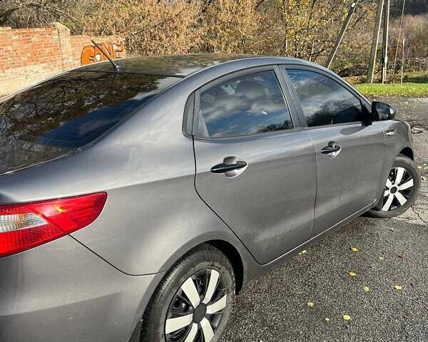 Серый Киа Рио, объемом двигателя 1.4 л и пробегом 190 тыс. км за 7000 $, фото 1 на Automoto.ua
