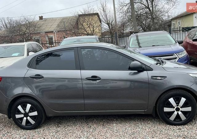 Сірий Кіа Ріо, об'ємом двигуна 1.4 л та пробігом 190 тис. км за 7500 $, фото 7 на Automoto.ua