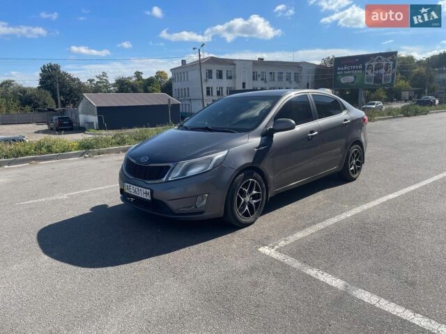 Сірий Кіа Ріо, об'ємом двигуна 1.4 л та пробігом 219 тис. км за 5900 $, фото 1 на Automoto.ua