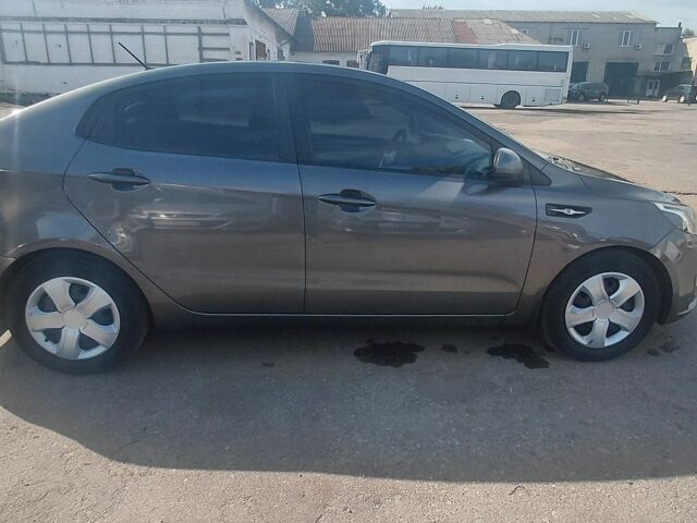 Сірий Кіа Ріо, об'ємом двигуна 1.4 л та пробігом 263 тис. км за 5800 $, фото 1 на Automoto.ua