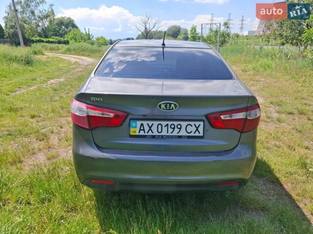 Серый Киа Рио, объемом двигателя 1.4 л и пробегом 235 тыс. км за 5600 $, фото 6 на Automoto.ua