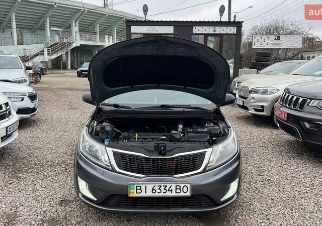 Сірий Кіа Ріо, об'ємом двигуна 1.4 л та пробігом 190 тис. км за 7500 $, фото 8 на Automoto.ua