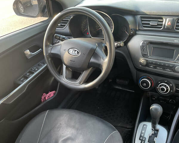 Серый Киа Рио, объемом двигателя 1.6 л и пробегом 94 тыс. км за 7600 $, фото 4 на Automoto.ua