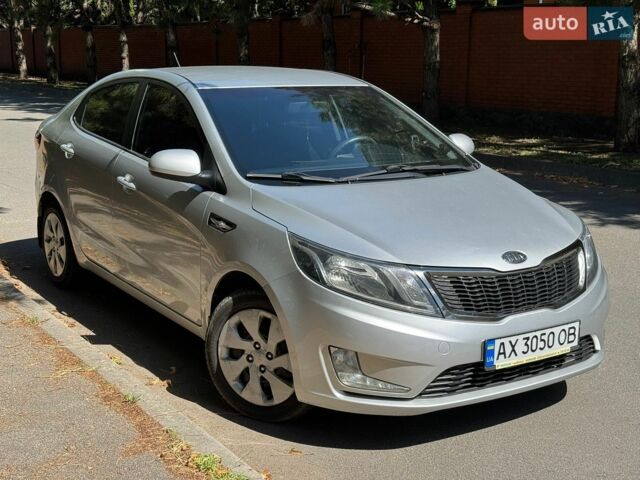 Сірий Кіа Ріо, об'ємом двигуна 1.4 л та пробігом 94 тис. км за 8799 $, фото 7 на Automoto.ua