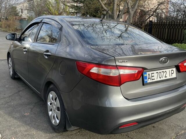 Сірий Кіа Ріо, об'ємом двигуна 1.4 л та пробігом 170 тис. км за 5999 $, фото 1 на Automoto.ua