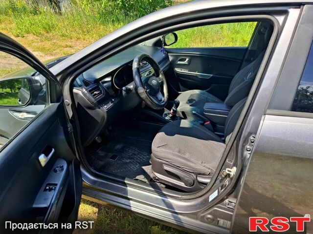Серый Киа Рио, объемом двигателя 1.4 л и пробегом 235 тыс. км за 5600 $, фото 6 на Automoto.ua