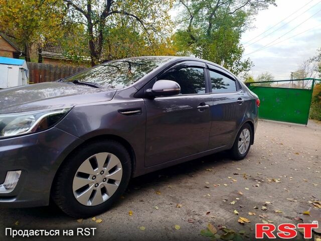 Серый Киа Рио, объемом двигателя 1.6 л и пробегом 189 тыс. км за 7299 $, фото 1 на Automoto.ua