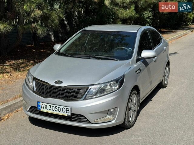 Сірий Кіа Ріо, об'ємом двигуна 1.4 л та пробігом 94 тис. км за 8799 $, фото 1 на Automoto.ua