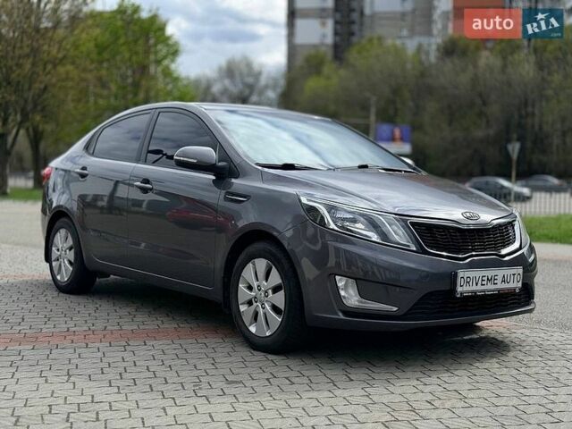 Серый Киа Рио, объемом двигателя 1.59 л и пробегом 206 тыс. км за 7499 $, фото 2 на Automoto.ua