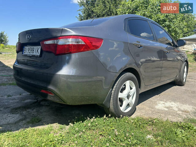 Серый Киа Рио, объемом двигателя 1.6 л и пробегом 250 тыс. км за 6999 $, фото 5 на Automoto.ua