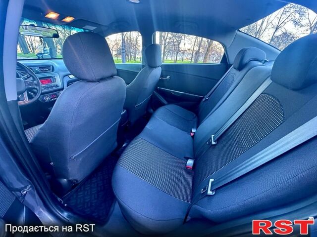 Сірий Кіа Ріо, об'ємом двигуна 1.6 л та пробігом 102 тис. км за 9000 $, фото 9 на Automoto.ua