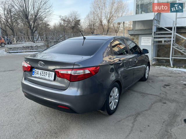 Серый Киа Рио, объемом двигателя 1.59 л и пробегом 212 тыс. км за 8400 $, фото 3 на Automoto.ua