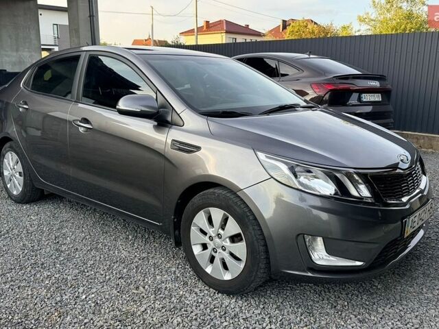 Сірий Кіа Ріо, об'ємом двигуна 1.59 л та пробігом 73 тис. км за 8299 $, фото 1 на Automoto.ua