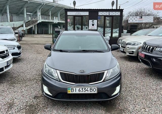 Сірий Кіа Ріо, об'ємом двигуна 1.4 л та пробігом 190 тис. км за 7500 $, фото 2 на Automoto.ua