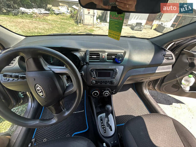 Серый Киа Рио, объемом двигателя 1.6 л и пробегом 250 тыс. км за 6999 $, фото 12 на Automoto.ua