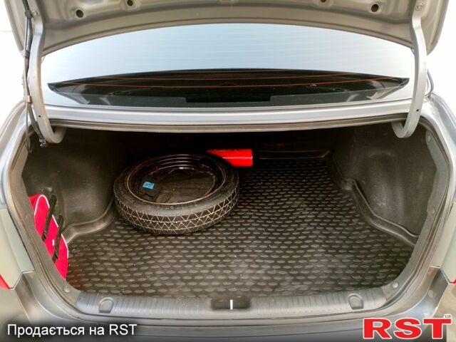 Серый Киа Рио, объемом двигателя 1.6 л и пробегом 223 тыс. км за 7550 $, фото 2 на Automoto.ua