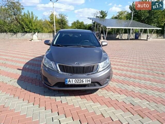 Сірий Кіа Ріо, об'ємом двигуна 1.4 л та пробігом 131 тис. км за 7500 $, фото 1 на Automoto.ua