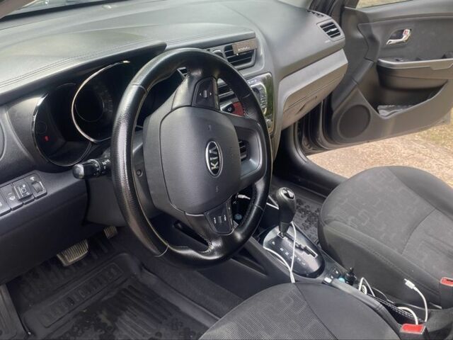 Сірий Кіа Ріо, об'ємом двигуна 1.6 л та пробігом 249 тис. км за 8604 $, фото 7 на Automoto.ua