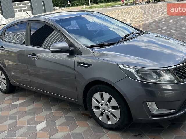 Серый Киа Рио, объемом двигателя 1.59 л и пробегом 179 тыс. км за 7900 $, фото 2 на Automoto.ua