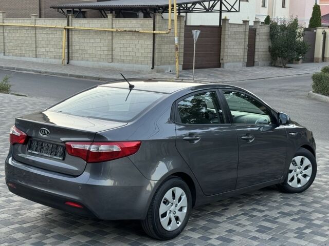 Серый Киа Рио, объемом двигателя 1.6 л и пробегом 133 тыс. км за 8300 $, фото 2 на Automoto.ua