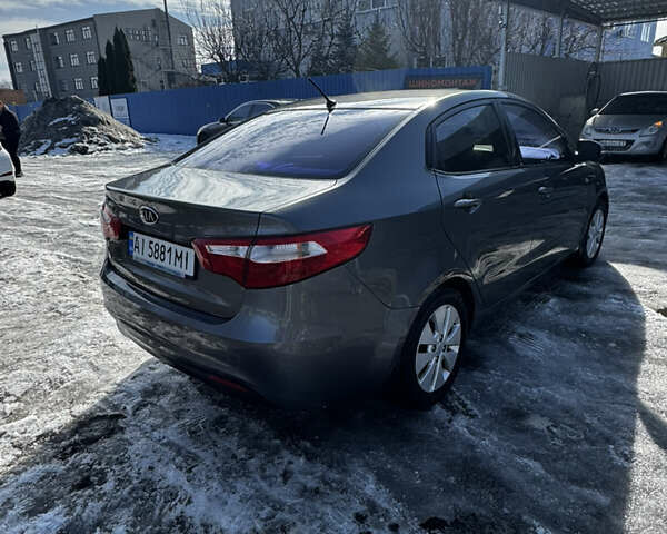 Серый Киа Рио, объемом двигателя 1.59 л и пробегом 275 тыс. км за 7000 $, фото 4 на Automoto.ua