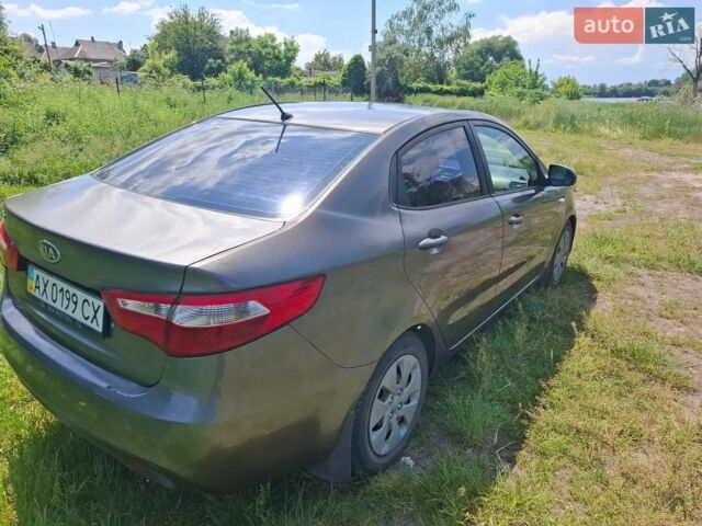 Серый Киа Рио, объемом двигателя 1.4 л и пробегом 235 тыс. км за 5600 $, фото 7 на Automoto.ua