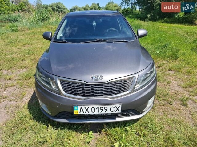 Серый Киа Рио, объемом двигателя 1.4 л и пробегом 235 тыс. км за 5600 $, фото 2 на Automoto.ua