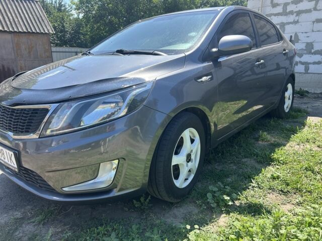 Серый Киа Рио, объемом двигателя 1.6 л и пробегом 250 тыс. км за 8299 $, фото 3 на Automoto.ua