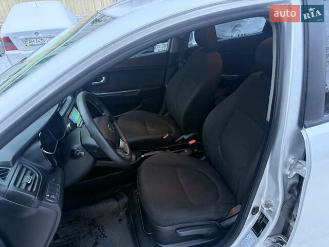 Серый Киа Рио, объемом двигателя 1.4 л и пробегом 130 тыс. км за 7450 $, фото 10 на Automoto.ua