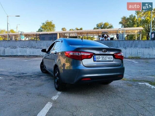 Серый Киа Рио, объемом двигателя 1.4 л и пробегом 225 тыс. км за 5200 $, фото 4 на Automoto.ua