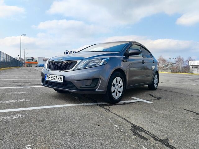 Серый Киа Рио, объемом двигателя 1.4 л и пробегом 260 тыс. км за 5000 $, фото 4 на Automoto.ua