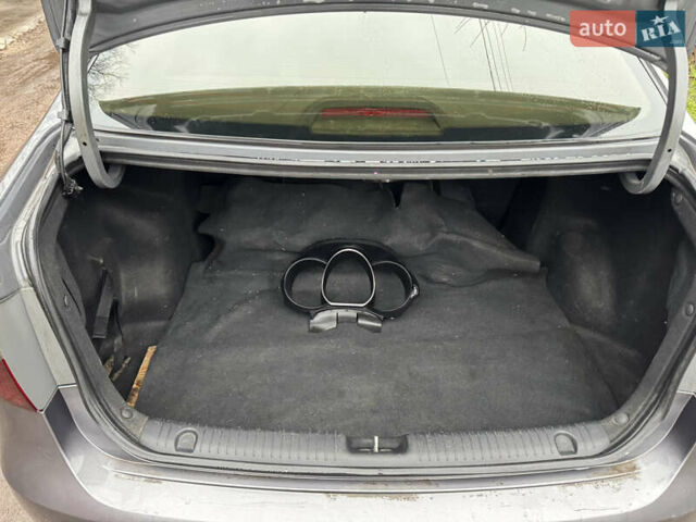 Серый Киа Рио, объемом двигателя 1.4 л и пробегом 250 тыс. км за 1950 $, фото 21 на Automoto.ua