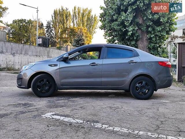 Серый Киа Рио, объемом двигателя 1.4 л и пробегом 225 тыс. км за 5200 $, фото 10 на Automoto.ua