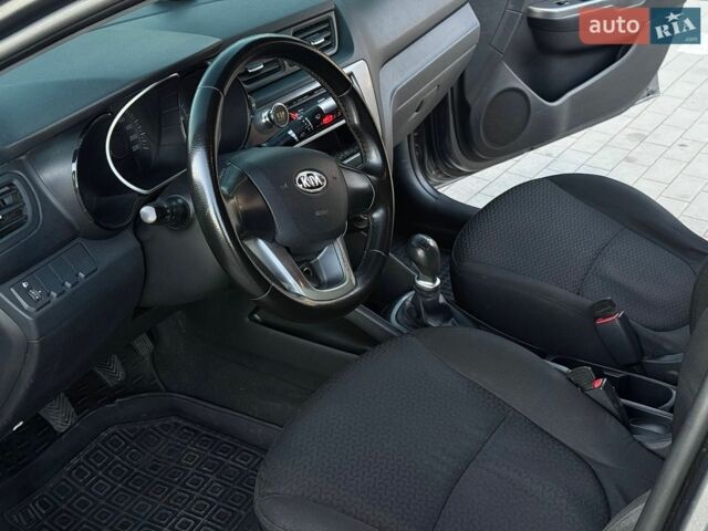 Сірий Кіа Ріо, об'ємом двигуна 1.4 л та пробігом 170 тис. км за 5500 $, фото 16 на Automoto.ua