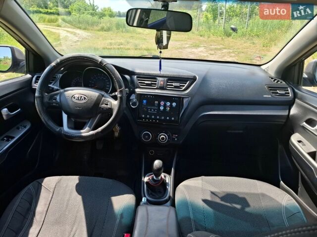 Серый Киа Рио, объемом двигателя 1.4 л и пробегом 235 тыс. км за 5600 $, фото 13 на Automoto.ua