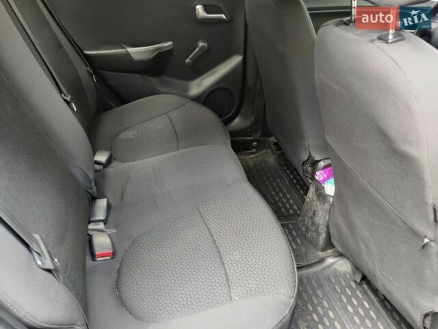 Серый Киа Рио, объемом двигателя 1.4 л и пробегом 242 тыс. км за 5750 $, фото 2 на Automoto.ua