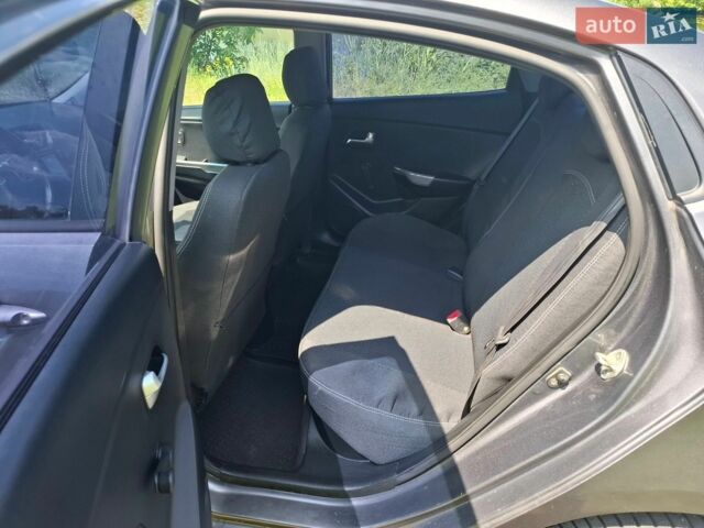 Серый Киа Рио, объемом двигателя 1.4 л и пробегом 235 тыс. км за 5600 $, фото 10 на Automoto.ua