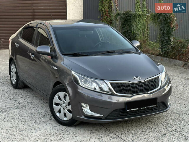 Сірий Кіа Ріо, об'ємом двигуна 1.6 л та пробігом 130 тис. км за 8500 $, фото 10 на Automoto.ua