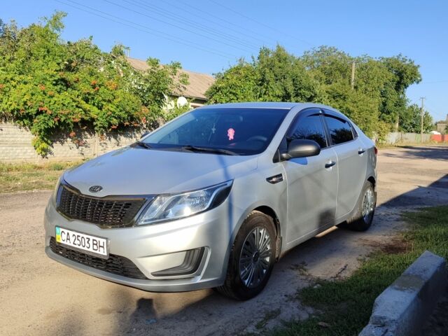 Сірий Кіа Ріо, об'ємом двигуна 1.4 л та пробігом 216 тис. км за 6802 $, фото 1 на Automoto.ua