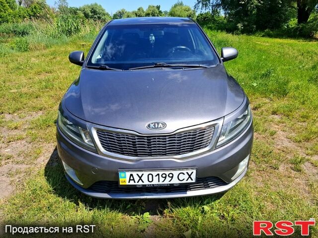 Серый Киа Рио, объемом двигателя 1.4 л и пробегом 235 тыс. км за 5600 $, фото 3 на Automoto.ua