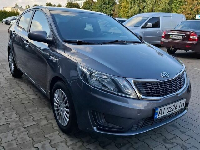 Серый Киа Рио, объемом двигателя 1.4 л и пробегом 131 тыс. км за 7900 $, фото 12 на Automoto.ua