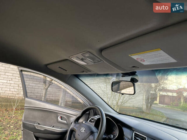 Серый Киа Рио, объемом двигателя 1.4 л и пробегом 167 тыс. км за 5999 $, фото 20 на Automoto.ua