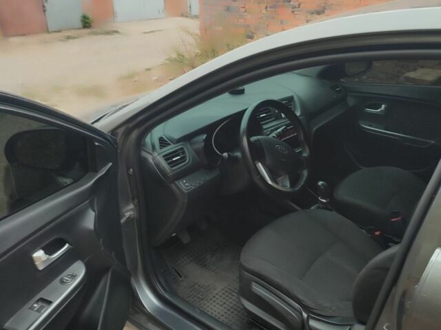 Серый Киа Рио, объемом двигателя 1.4 л и пробегом 170 тыс. км за 5496 $, фото 7 на Automoto.ua