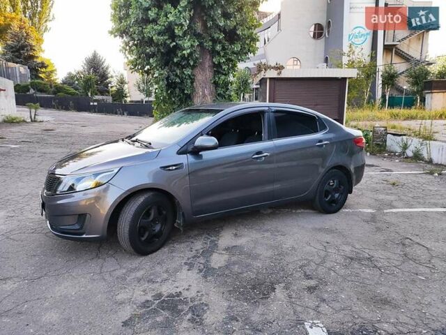 Серый Киа Рио, объемом двигателя 1.4 л и пробегом 225 тыс. км за 5200 $, фото 9 на Automoto.ua