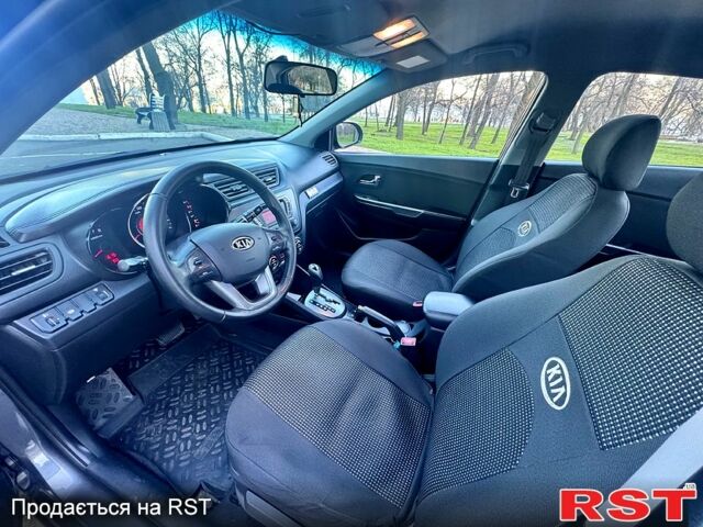 Сірий Кіа Ріо, об'ємом двигуна 1.6 л та пробігом 102 тис. км за 9000 $, фото 7 на Automoto.ua