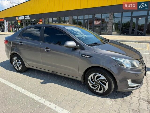 Сірий Кіа Ріо, об'ємом двигуна 1.4 л та пробігом 106 тис. км за 7500 $, фото 1 на Automoto.ua