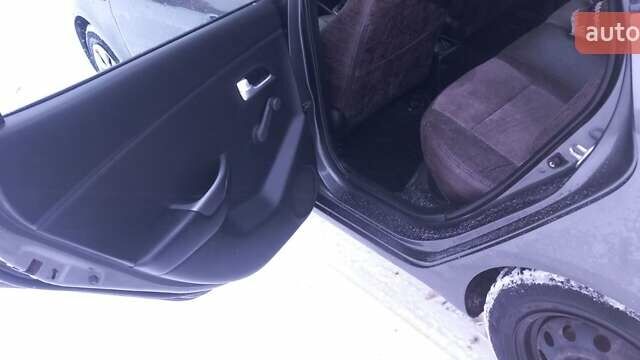 Серый Киа Рио, объемом двигателя 1.4 л и пробегом 133 тыс. км за 8200 $, фото 24 на Automoto.ua