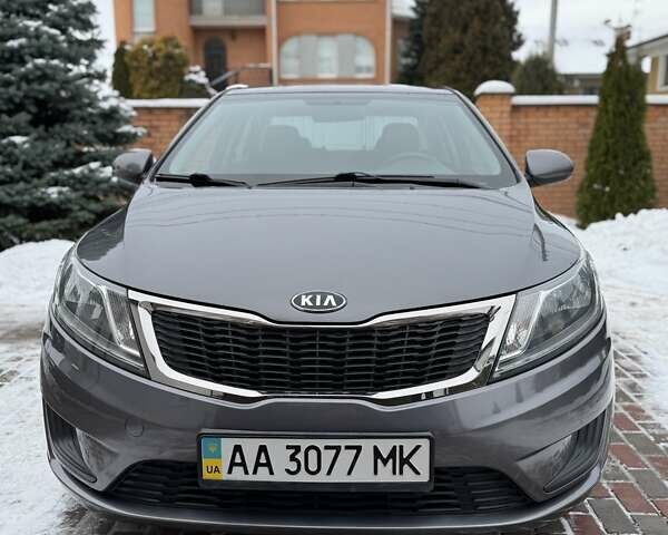 Серый Киа Рио, объемом двигателя 1.4 л и пробегом 82 тыс. км за 9200 $, фото 1 на Automoto.ua