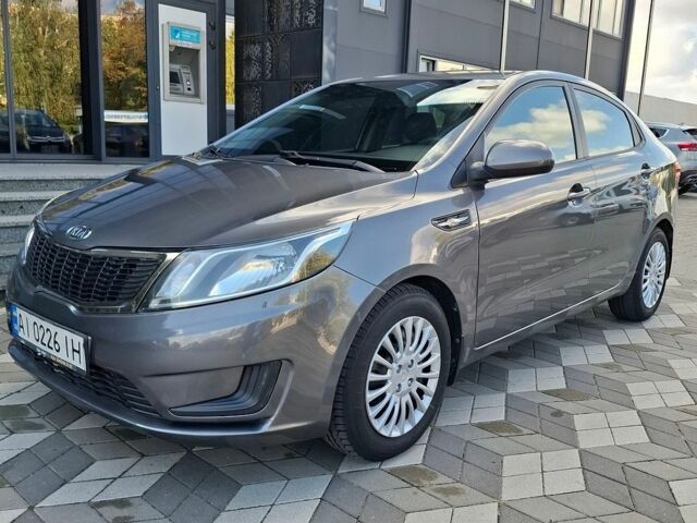 Серый Киа Рио, объемом двигателя 1.4 л и пробегом 131 тыс. км за 7900 $, фото 4 на Automoto.ua